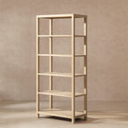 Tall, open-frame bookcase in light natural cerused pine with five shelves in a clean, minimalist wood design.