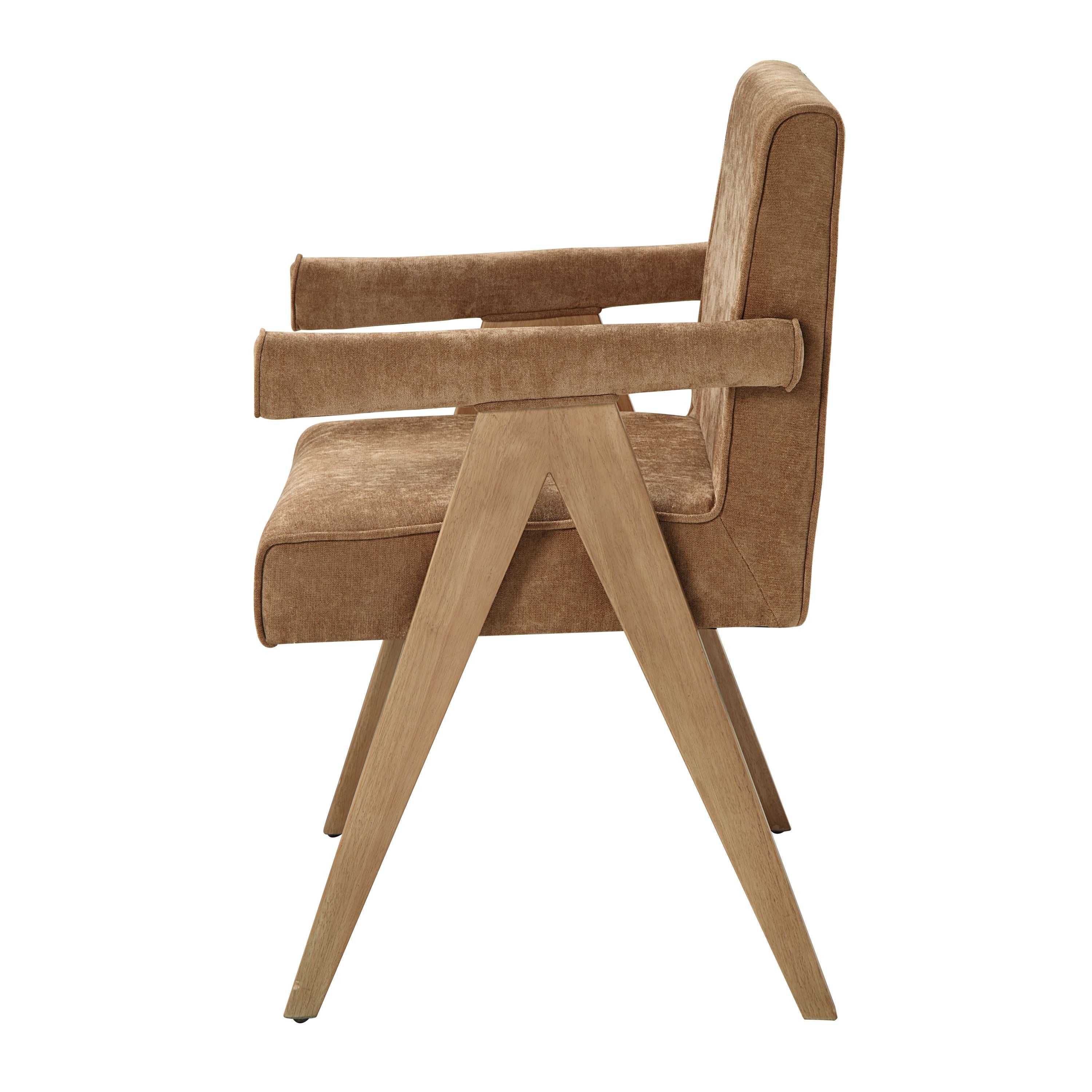 Side view of chocolate chenille upholstered dining chair with padded arms and angled light oak legs from 8-piece light oak dining set.