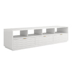 White Coastal Credenza for TVs up to 85 inches with three textured drawers and four open shelves, ideal for modern entertainment setups.