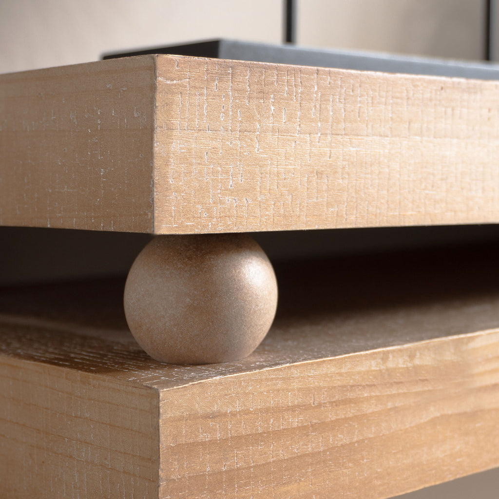 Detail of bead accent between tabletop layers on the Slim Natural Wood Console Table, showcasing its unique design element.