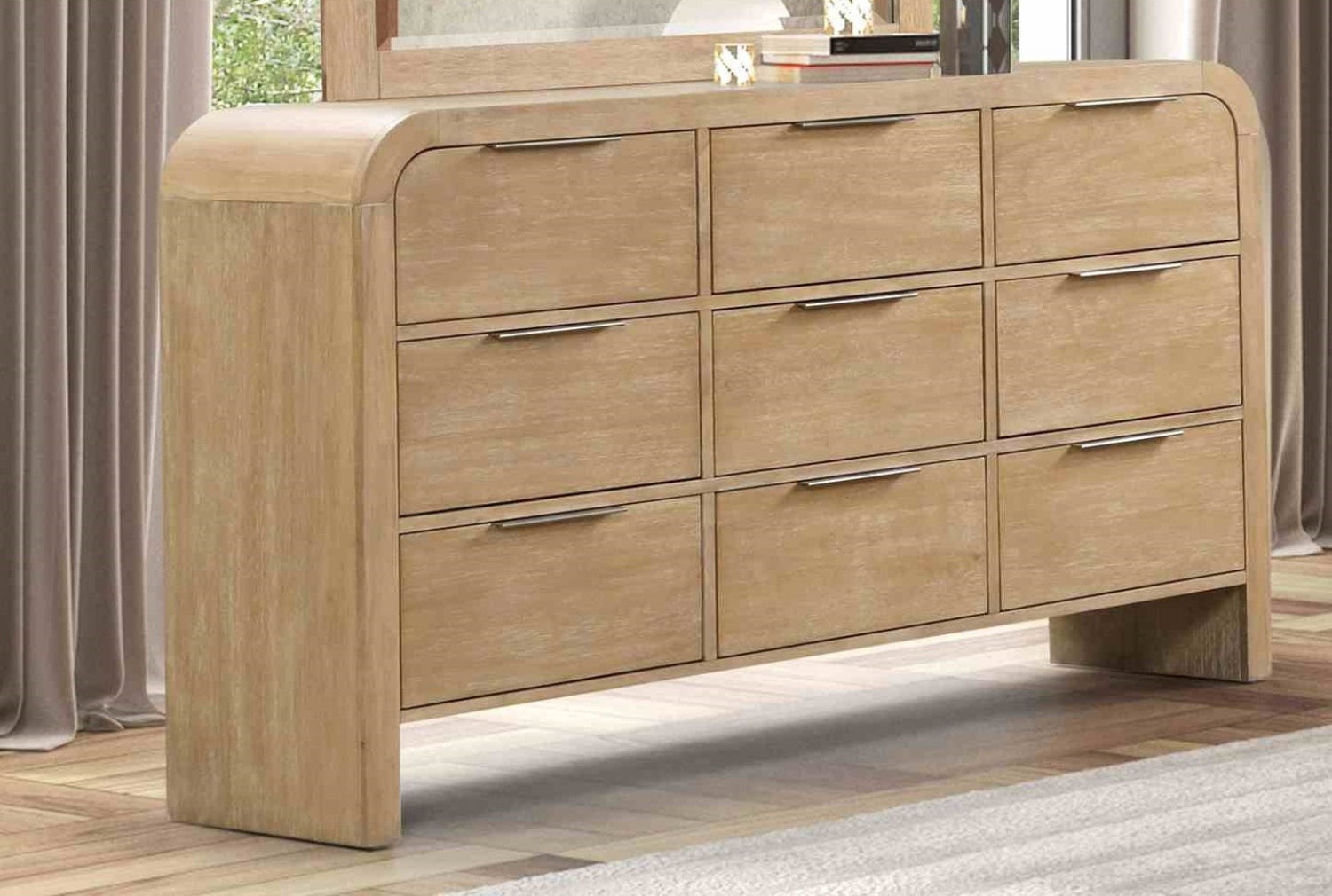 Natural finish rubber wood dresser with 9 spacious drawers and metal finger pulls, styled in a contemporary bedroom setting.
