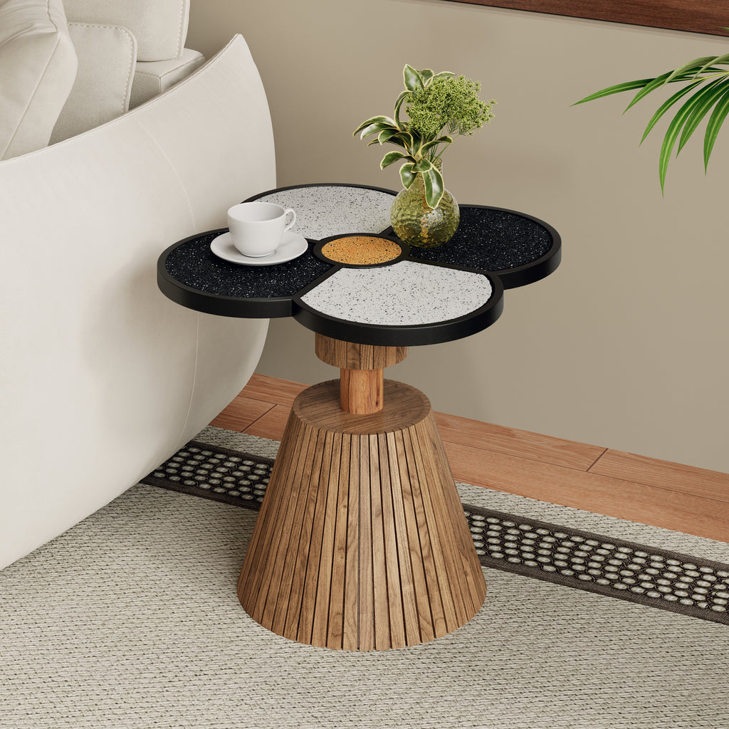 Four-Leaf Clover Accent Table with terrazzo top and wood-grain base beside a white sofa in a modern living room setting.
