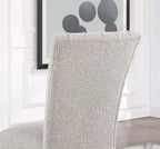 Backrest detail of gray boucle dining chair with curved design, part of the Genuine Marble Dining Table Set.