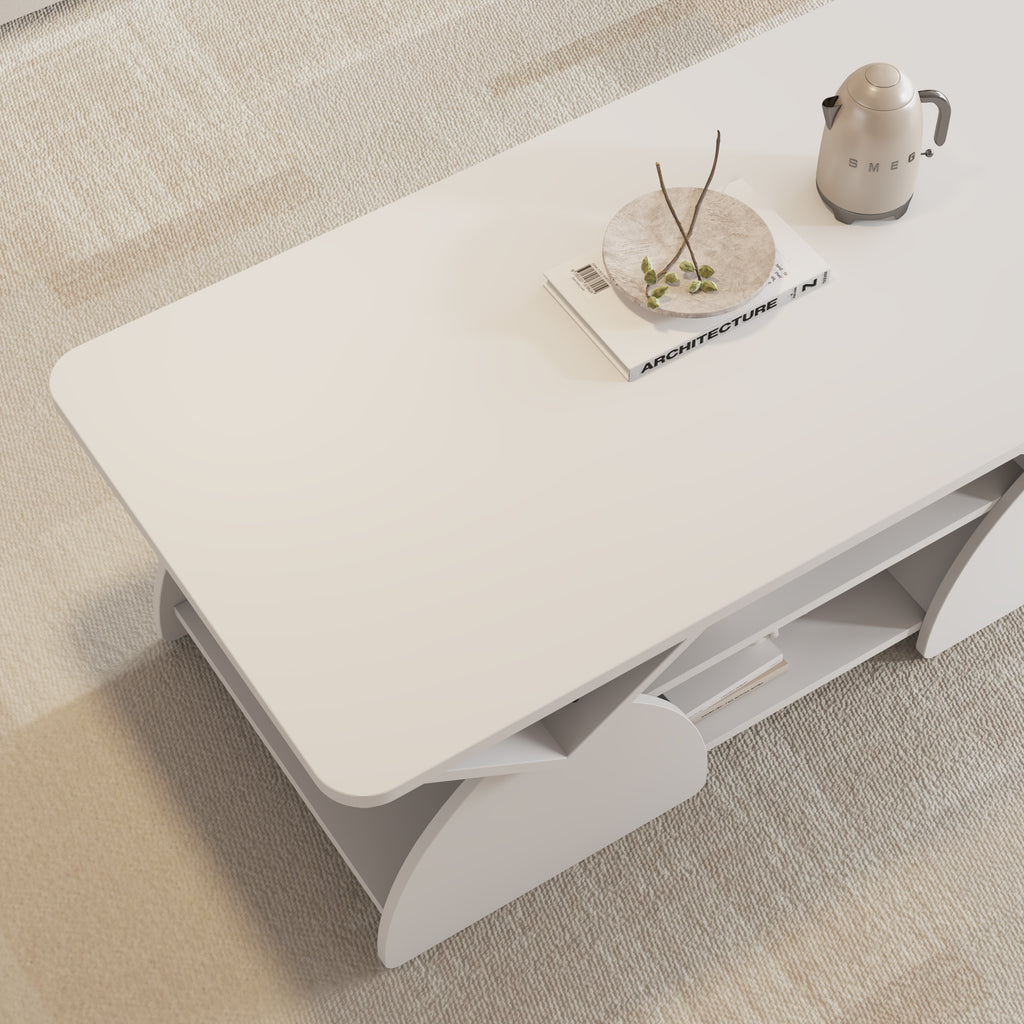 Close-up of coffee table top with decorative tray and book. Engineered wood design with hidden lower storage compartments.