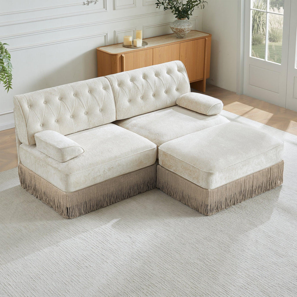 Modular Chesterfield Style Sofa with Tassel Skirt.