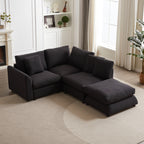 Corner view of modular L-shaped sofa with ottoman, showcasing plush cushions and pillows in a bright, elegant living space.