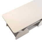 Close-up of tabletop on engineered wood coffee table with smooth white finish. Features hidden storage and modern design.