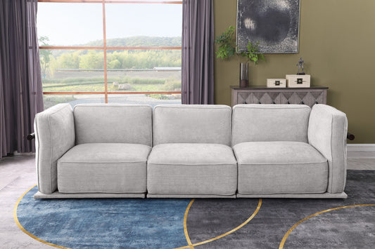 Modular fabric sofa set with ottoman in light gray, featuring a corner module and three seating units, ideal for modern living room interiors.