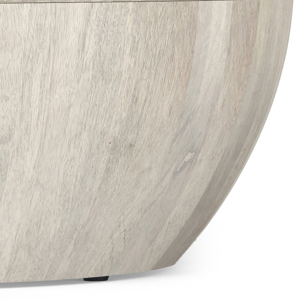 Detailed view of the lower side of the Elmbrook Drum Coffee Table, emphasizing the curved drum design and eco-friendly mango wood construction.