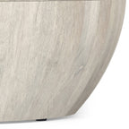 Detailed view of the lower side of the Elmbrook Drum Coffee Table, emphasizing the curved drum design and eco-friendly mango wood construction.