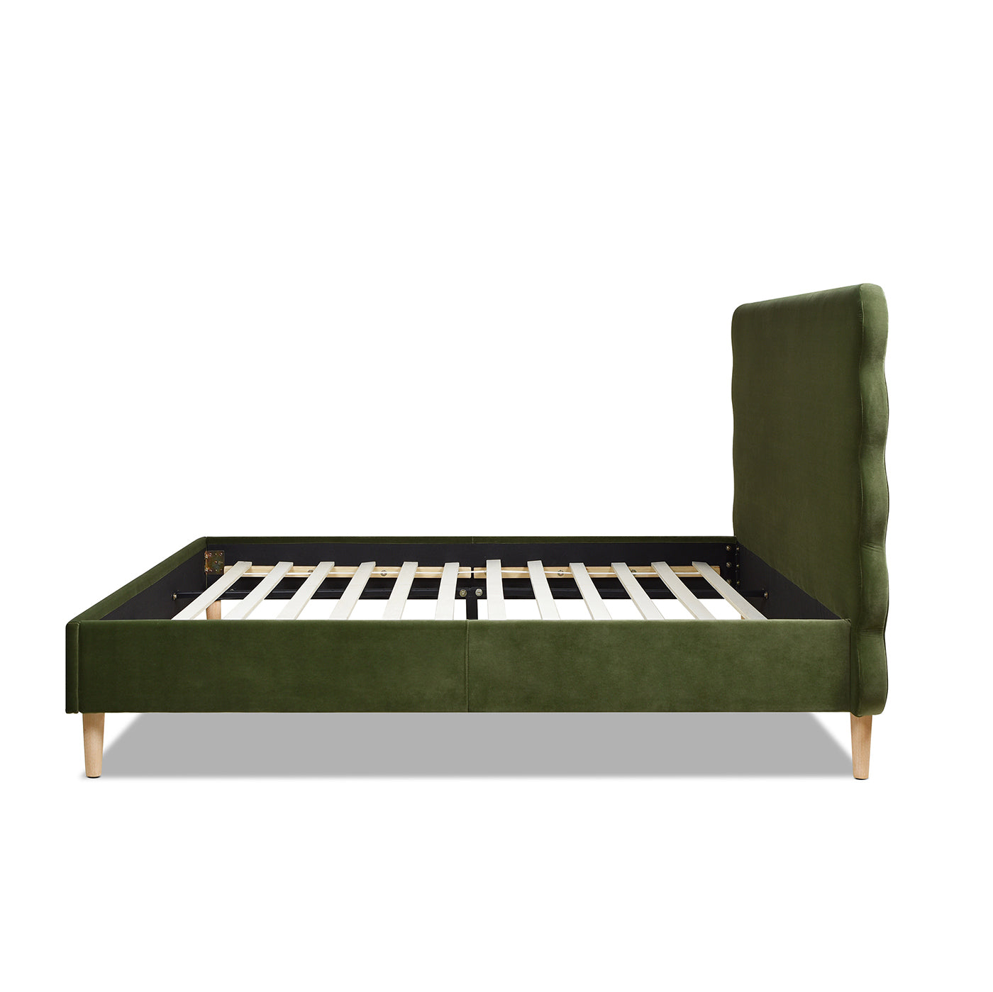 Side profile of the Stockholm Modern king platform bed in olive green velvet, showing slatted base and sculpted headboard.