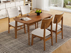 Angled view of 4-seat farmhouse dining table set with upholstered chairs, ideal for compact dining spaces.