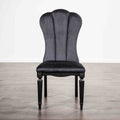 Black dining room side chair with fluted legs and high upholstered backrest, ideal for elegant dining spaces.