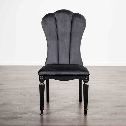 Black dining room side chair with fluted legs and high upholstered backrest, ideal for elegant dining spaces.