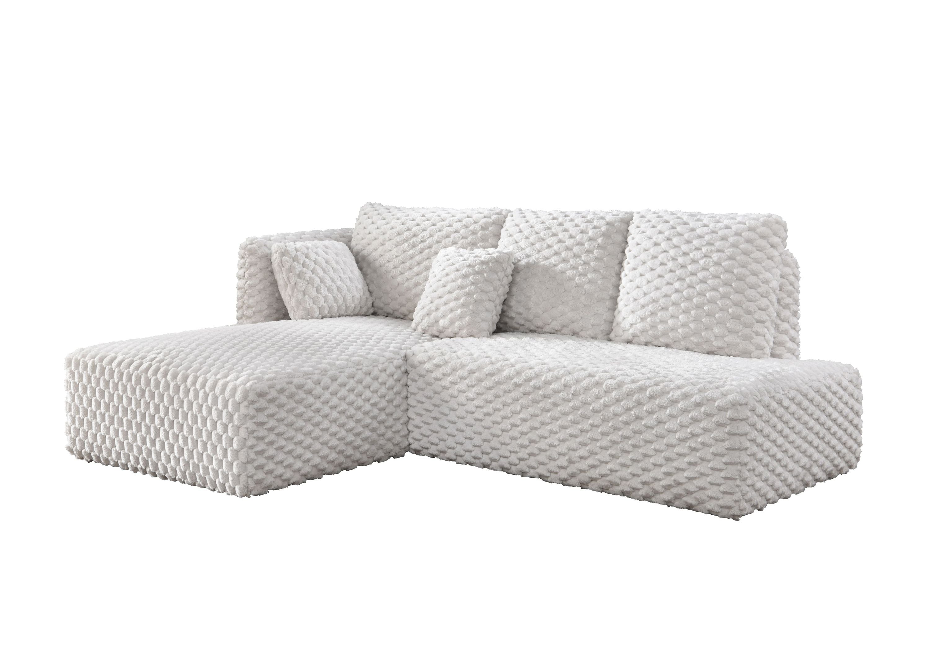 Angled view of Ivory Corduroy Sectional Sofa showing its soft corduroy texture and L-shaped configuration for cozy interiors.