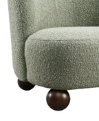 Green Boucle Fabric Accent Chair with Ball Feet.