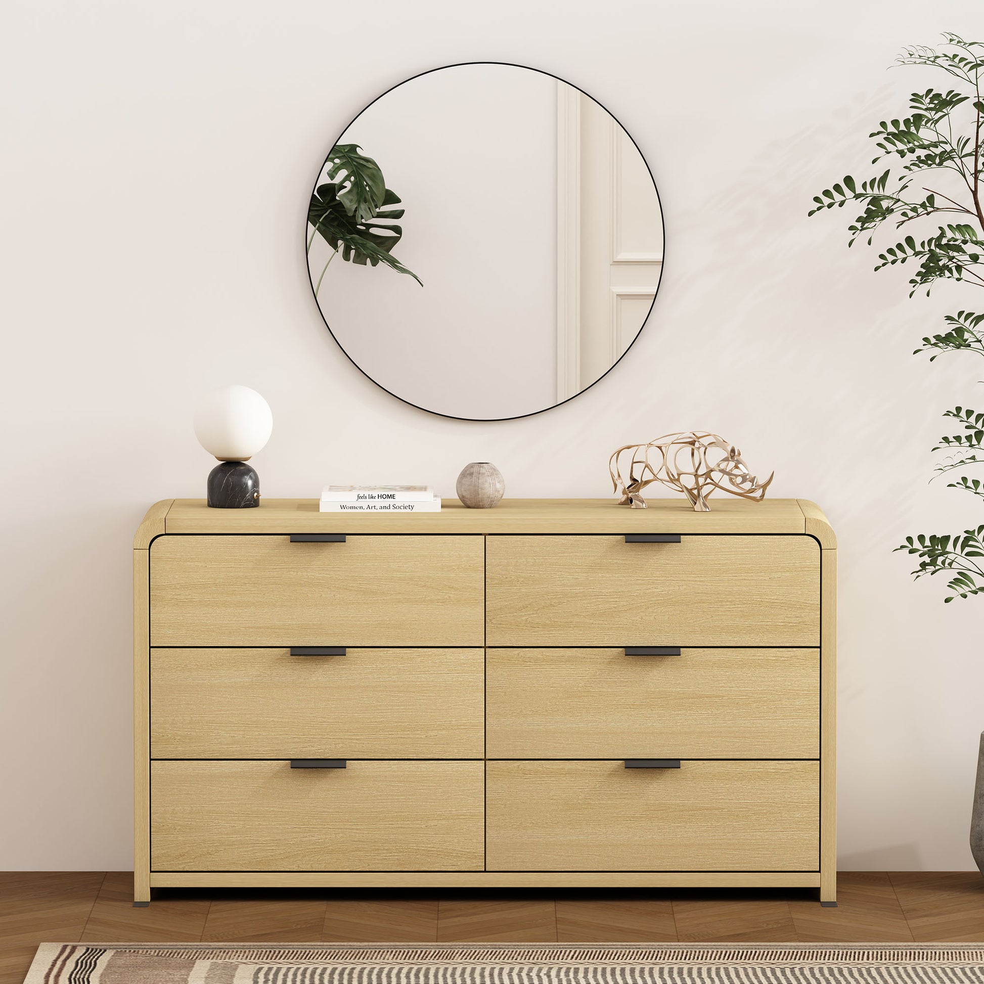 Grace 60" Dresser in Natural Oak styled in a bedroom with decor, showcasing its sleek design and spacious storage.