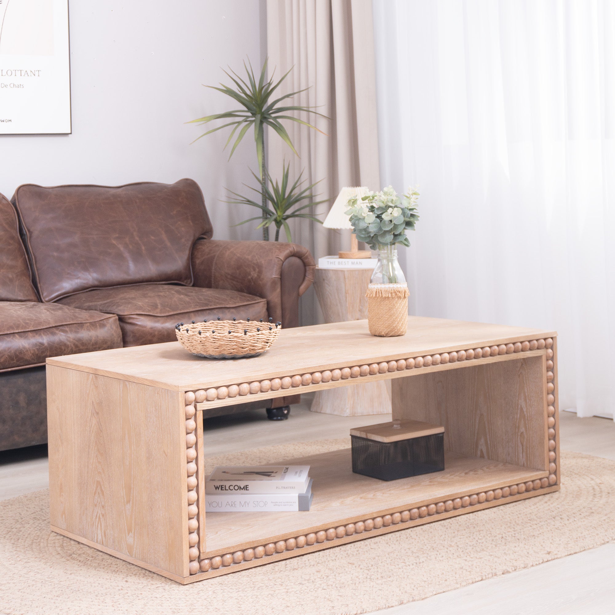 47.6-inch rustic coffee table styled in a cozy living room, featuring beaded edge detail and open shelf for storage or decor.