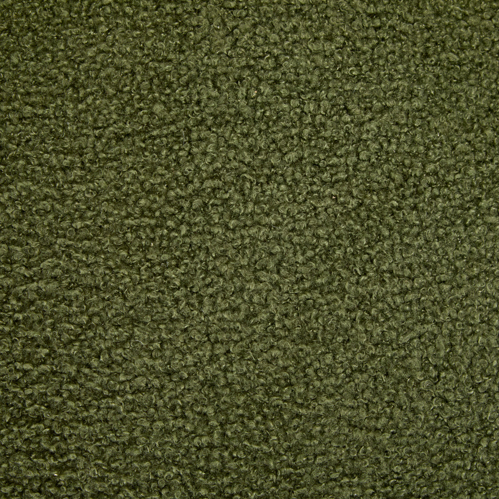 Close-up texture of olive green fabric used on modern dining chairs, showcasing soft and durable upholstery material.