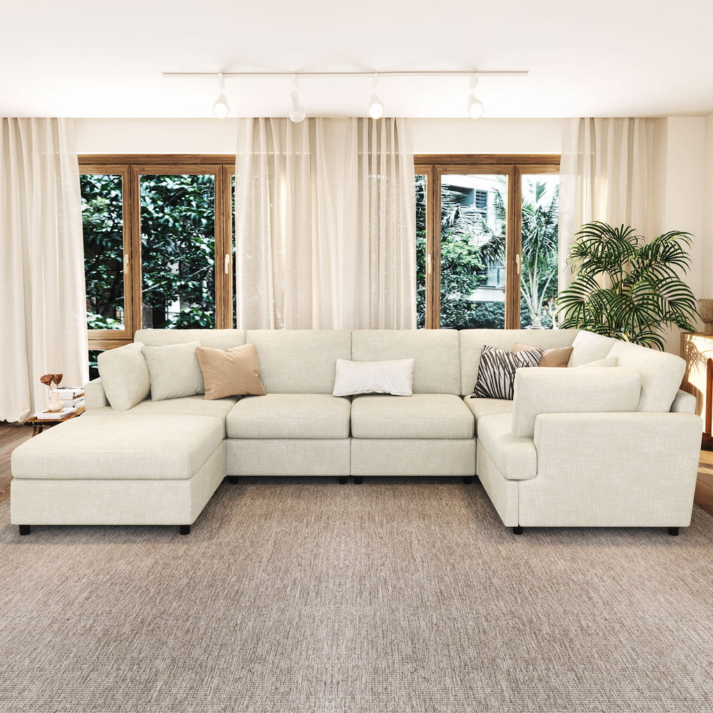 Modular U-shaped sectional sofa with movable ottoman, featuring soft chenille fabric and spacious seating for modern home interiors.