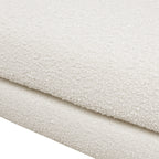 Detailed texture of the ivory white faux sherpa boucle fabric used in the Alpine 44' Sherpa Arm Chair.