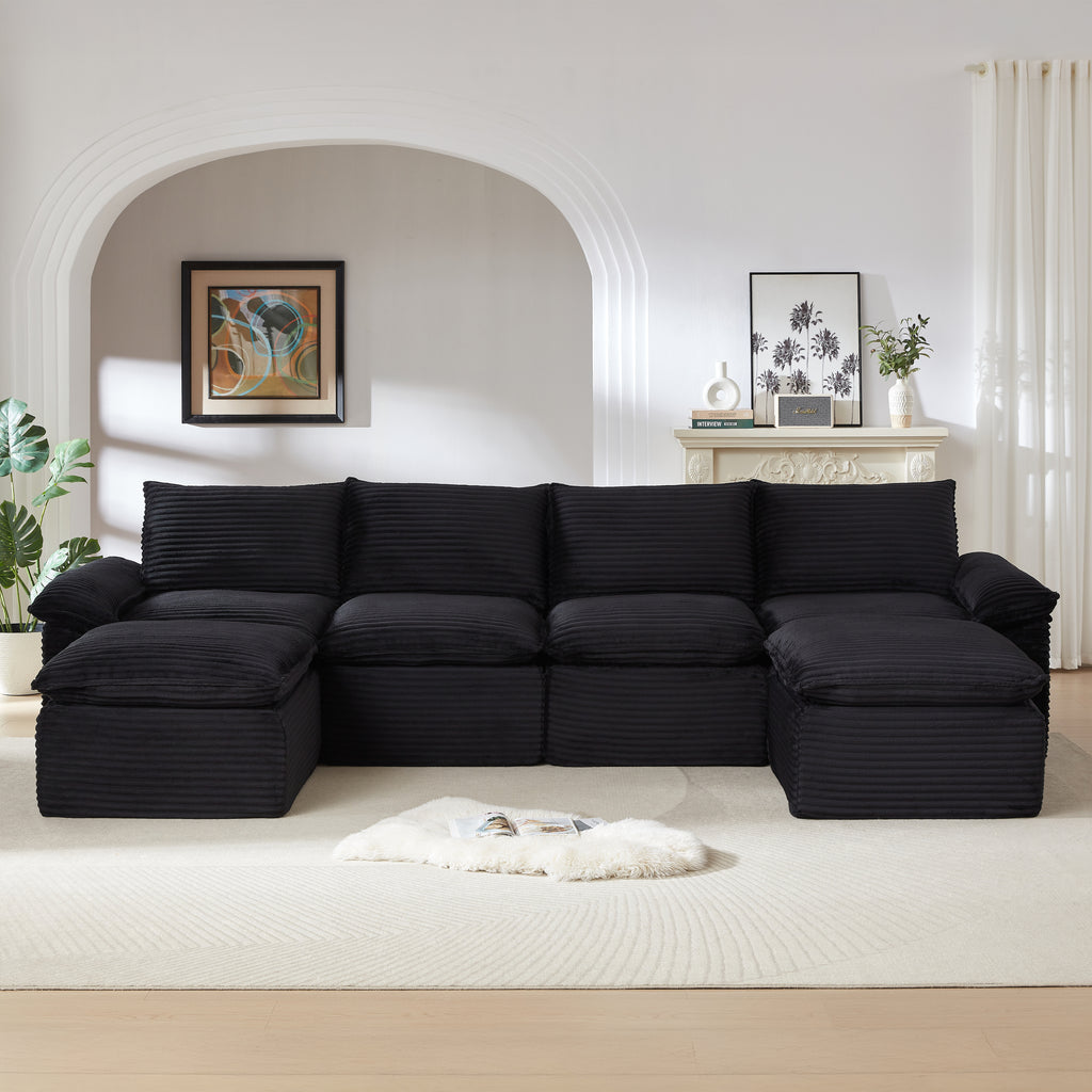 Corduroy Cloud Sofa - Modern Living Room Furniture with deep black upholstery, centered in a contemporary living space with neutral decor.