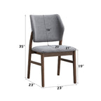 Sarha dining chair with dimensions 35x23x23 inches. Features cushioned seat and angled backrest for comfort.
