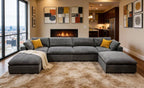 Modern charcoal gray upholstered modular sectional sofa with yellow toss pillows, arranged in a U-shape on a shaggy rug.