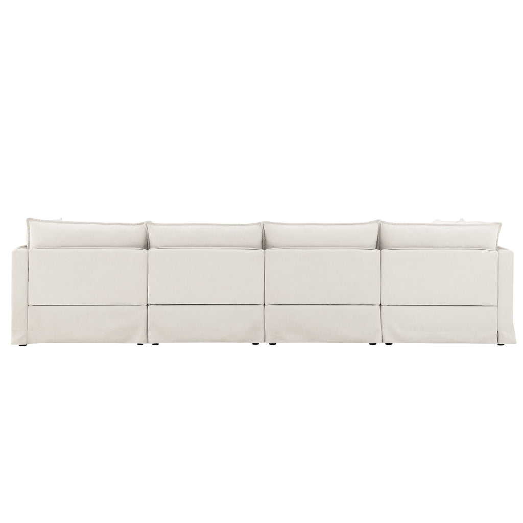 Back view of modular sectional sofa with ottoman, showcasing clean lines and uniform design for modern interiors.