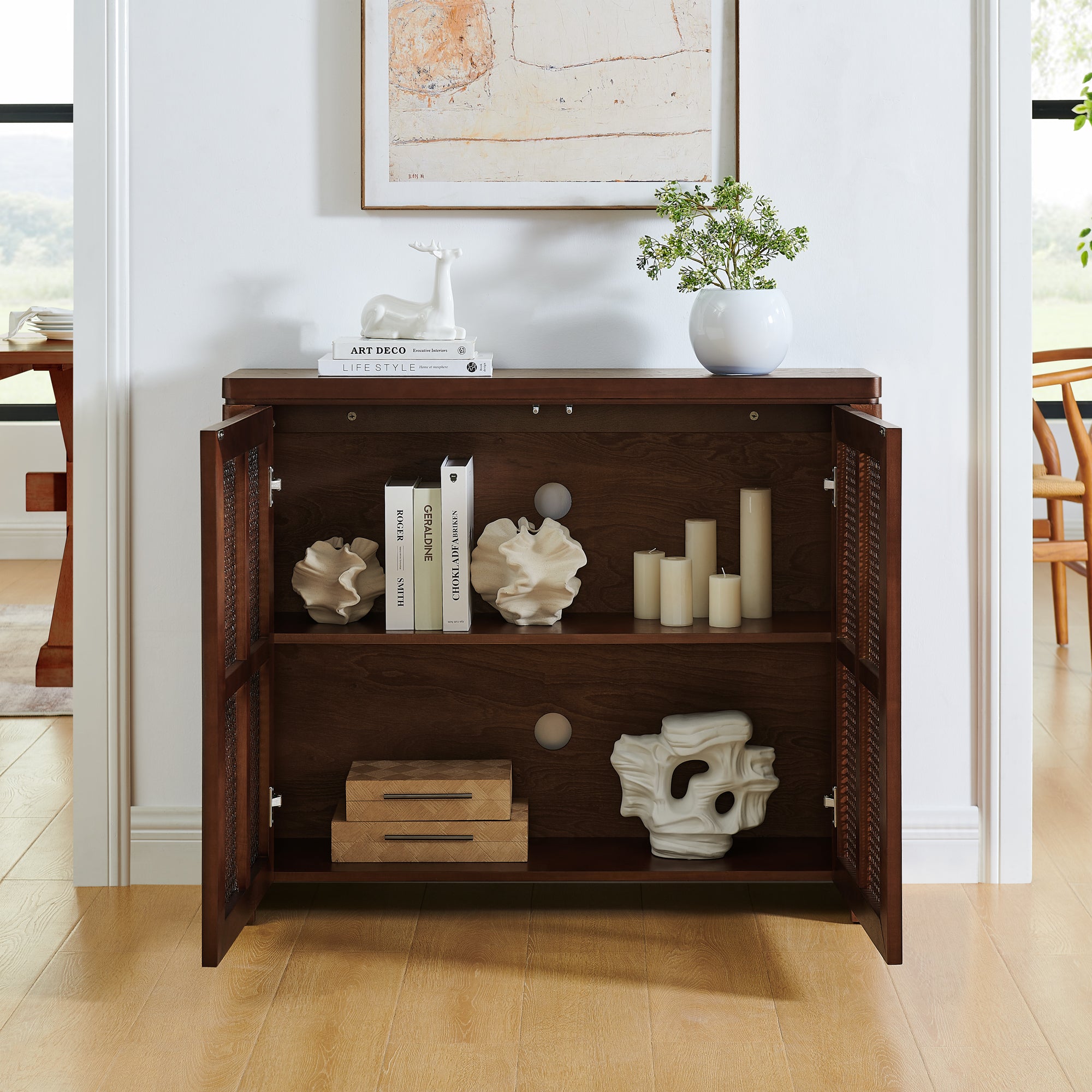 Interior view of Mid Century Rattan Sideboard Cabinet with outlet holes and adjustable shelving for organized storage.