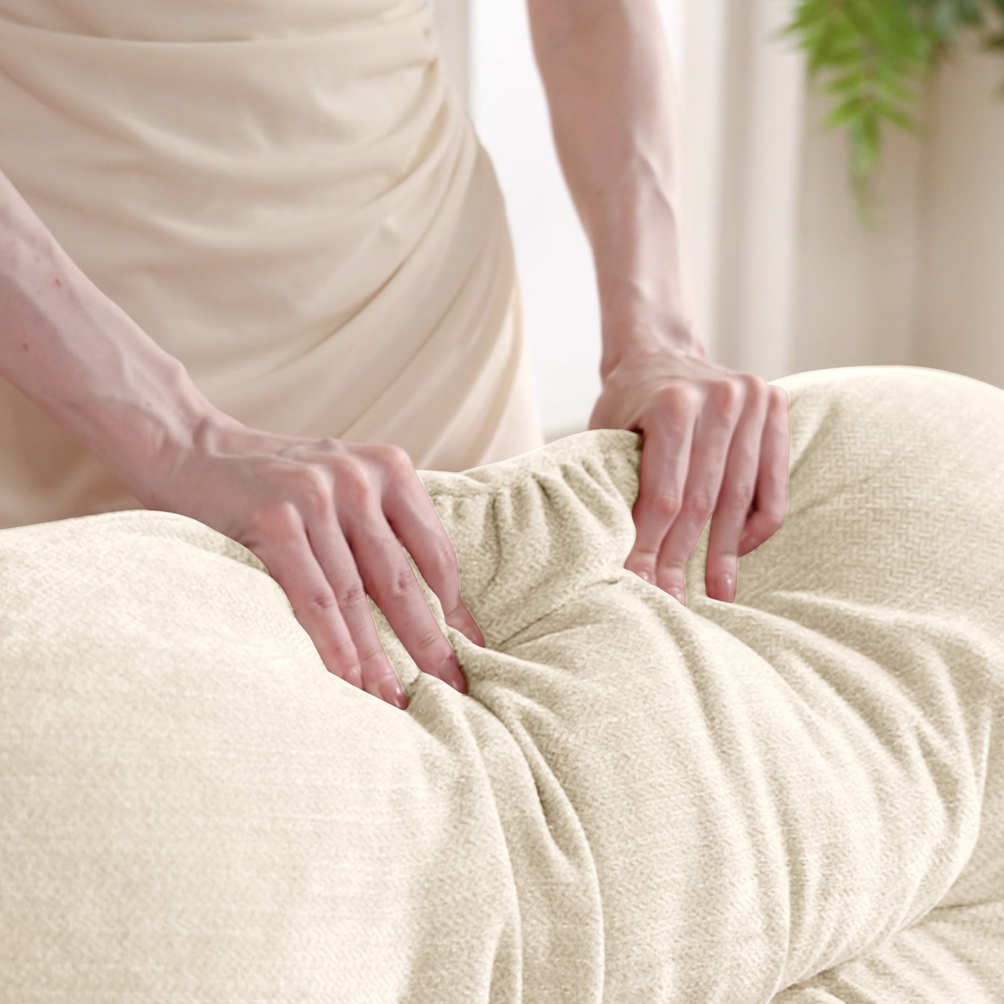 Hands pressing into the chenille cushions of the Modular L-Shaped Sofa - Sectional Couch, highlighting its softness and comfort.