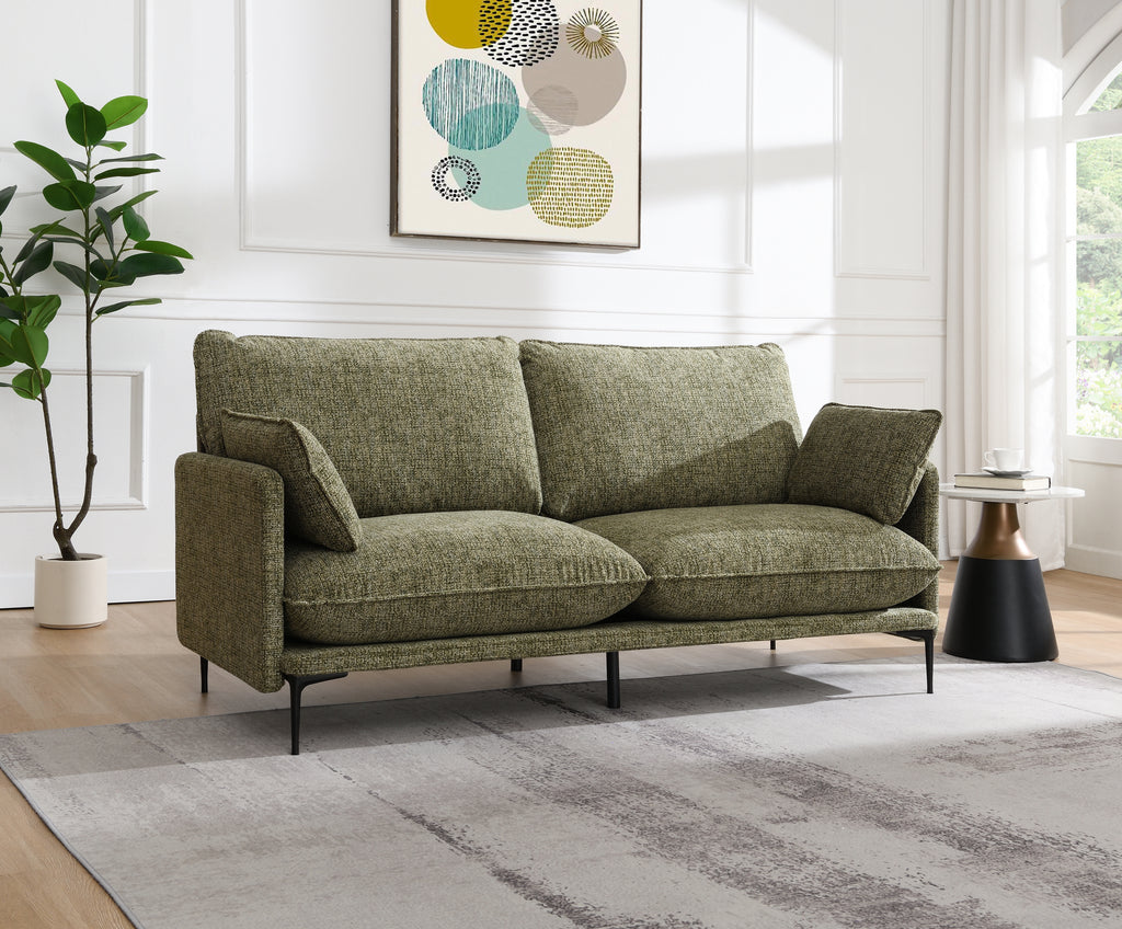 Dalton Green Fabric Sofa - Compressed Cushion in modern living room with tufted cushions, green chenille fabric, and black metal legs.