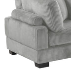 Close-up of Bentley Modular Sectional Sofa corner unit armrest in gray corduroy, featuring plush padding and modern ribbed design.