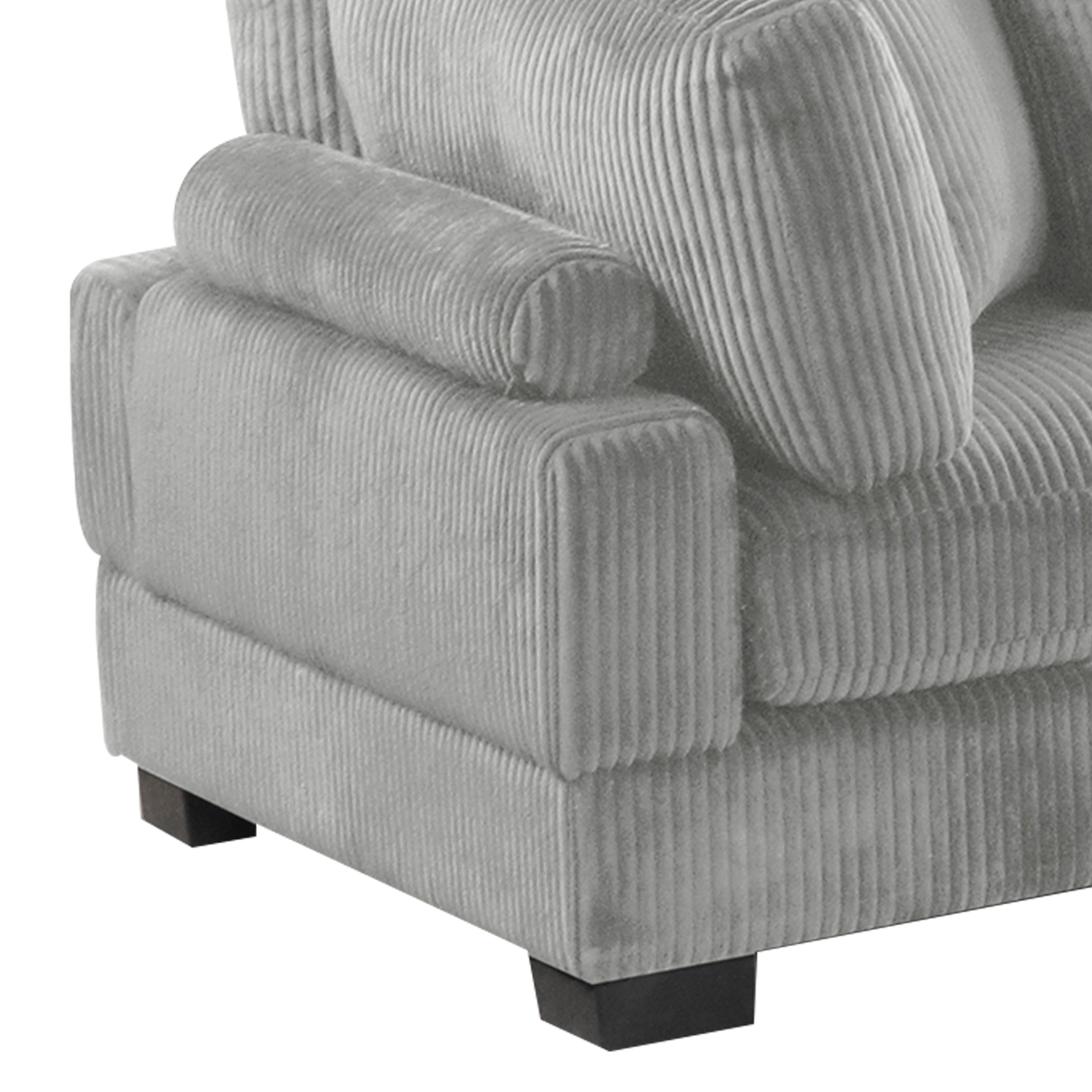 Close-up of Bentley Modular Sectional Sofa corner unit armrest in gray corduroy, featuring plush padding and modern ribbed design.