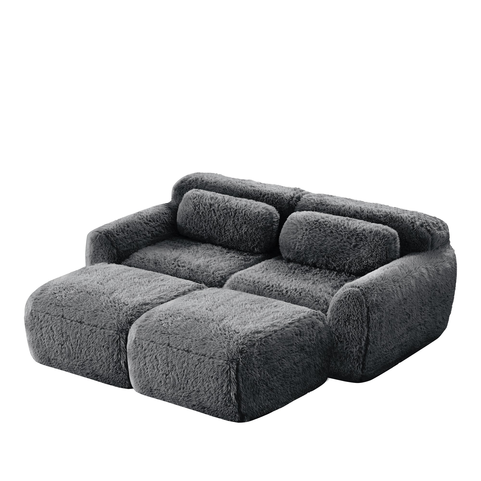 Angled view of Dark Grey Plush Modular Sofa with ergonomic pillows and ottoman, ideal for modern living room comfort.