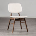 Mid-century dining chair with angled walnut legs and padded beige seat, ideal for modern dining room comfort and style.