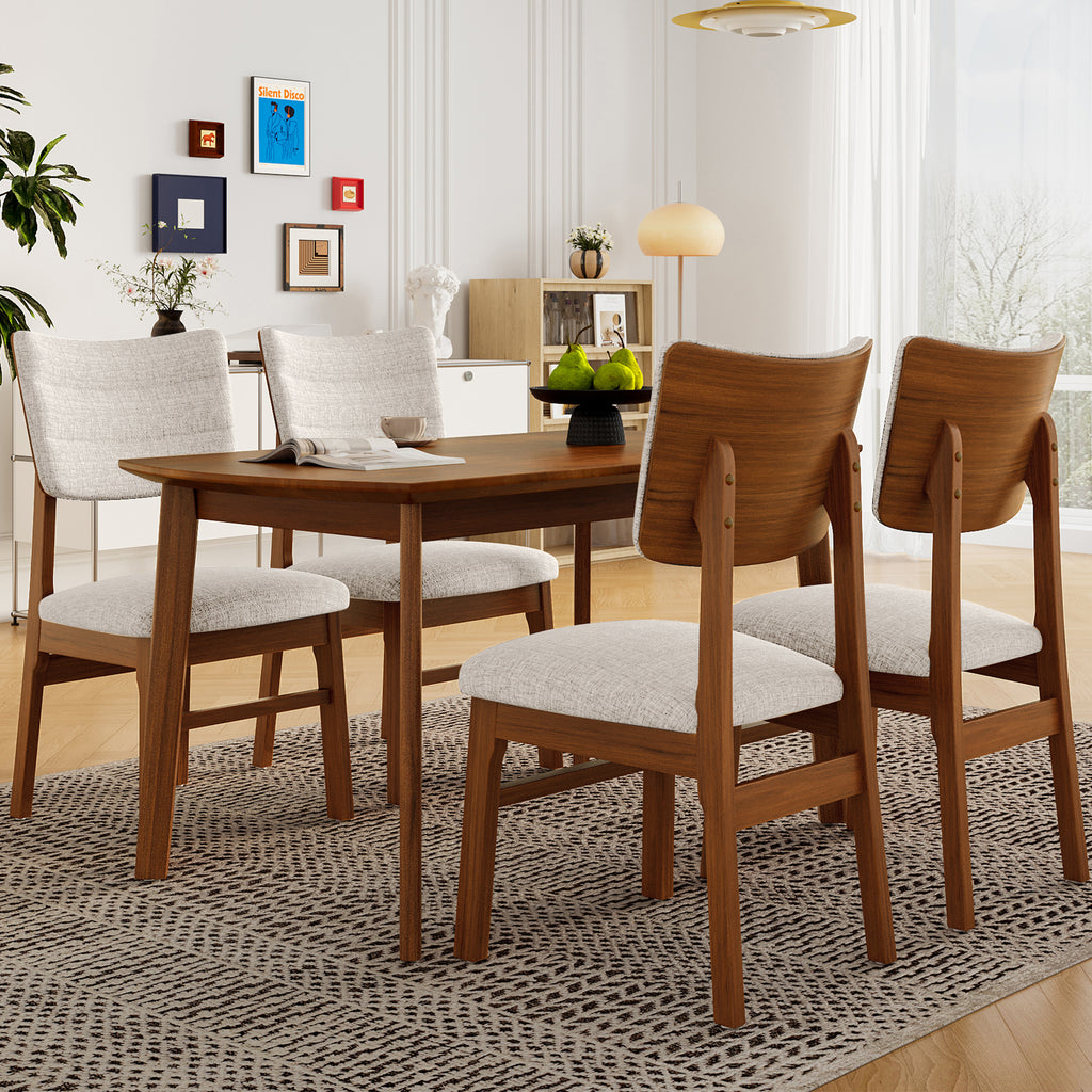 Farmhouse dining table set for 4 with wood frame and upholstered chairs in a modern dining room. Ideal for small spaces and stylish interiors.