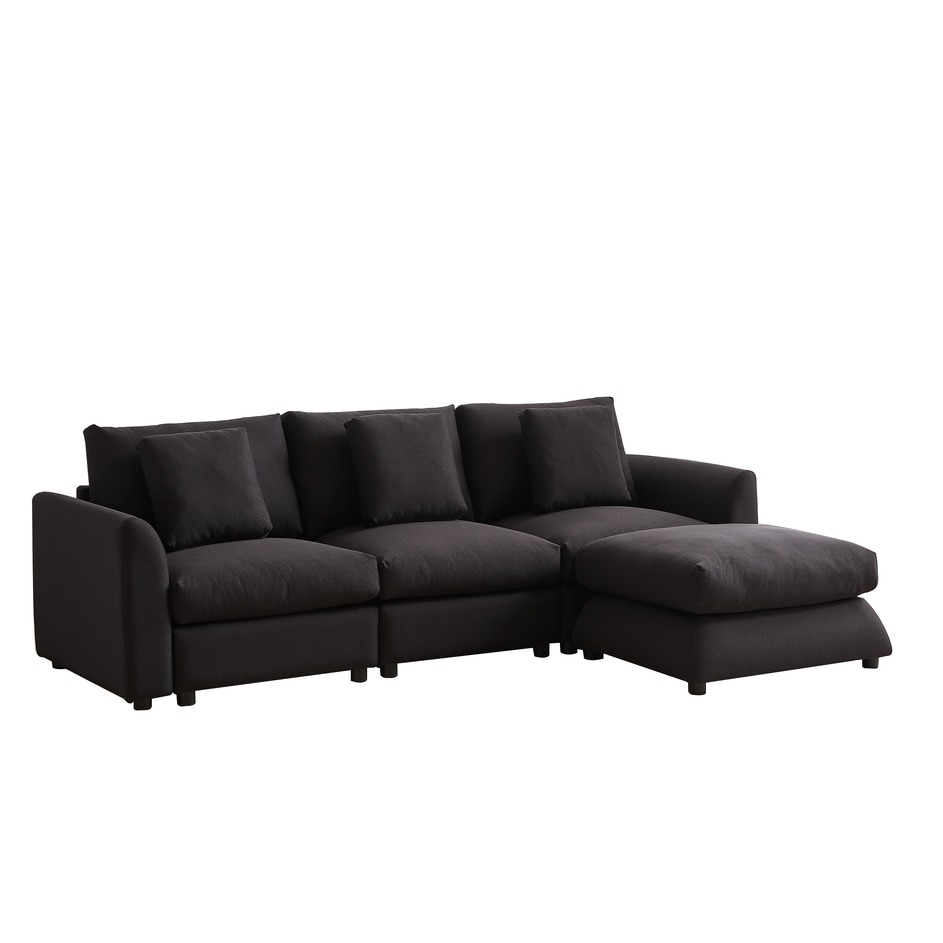 Angled view of modular L-shaped sofa with ottoman, 3 cushions, and 4 pillows in dark upholstery, designed for comfort and modern interiors.