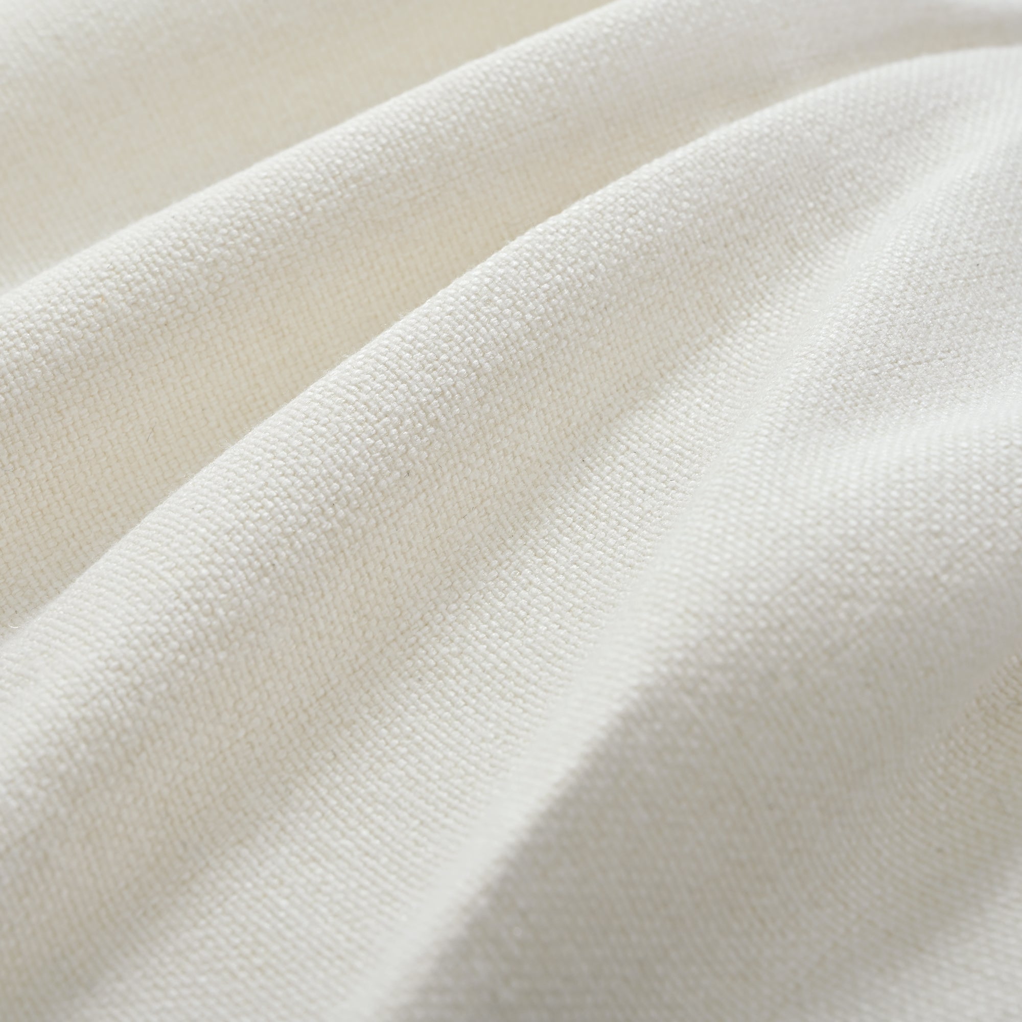 Textured close-up of cream chenille fabric used in U_STYLE U-shaped sectional sofa, emphasizing softness and premium quality material.