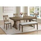 Full dining set featuring Amador Cross Back Chairs and bench in gray wood, styled in a modern dining space.