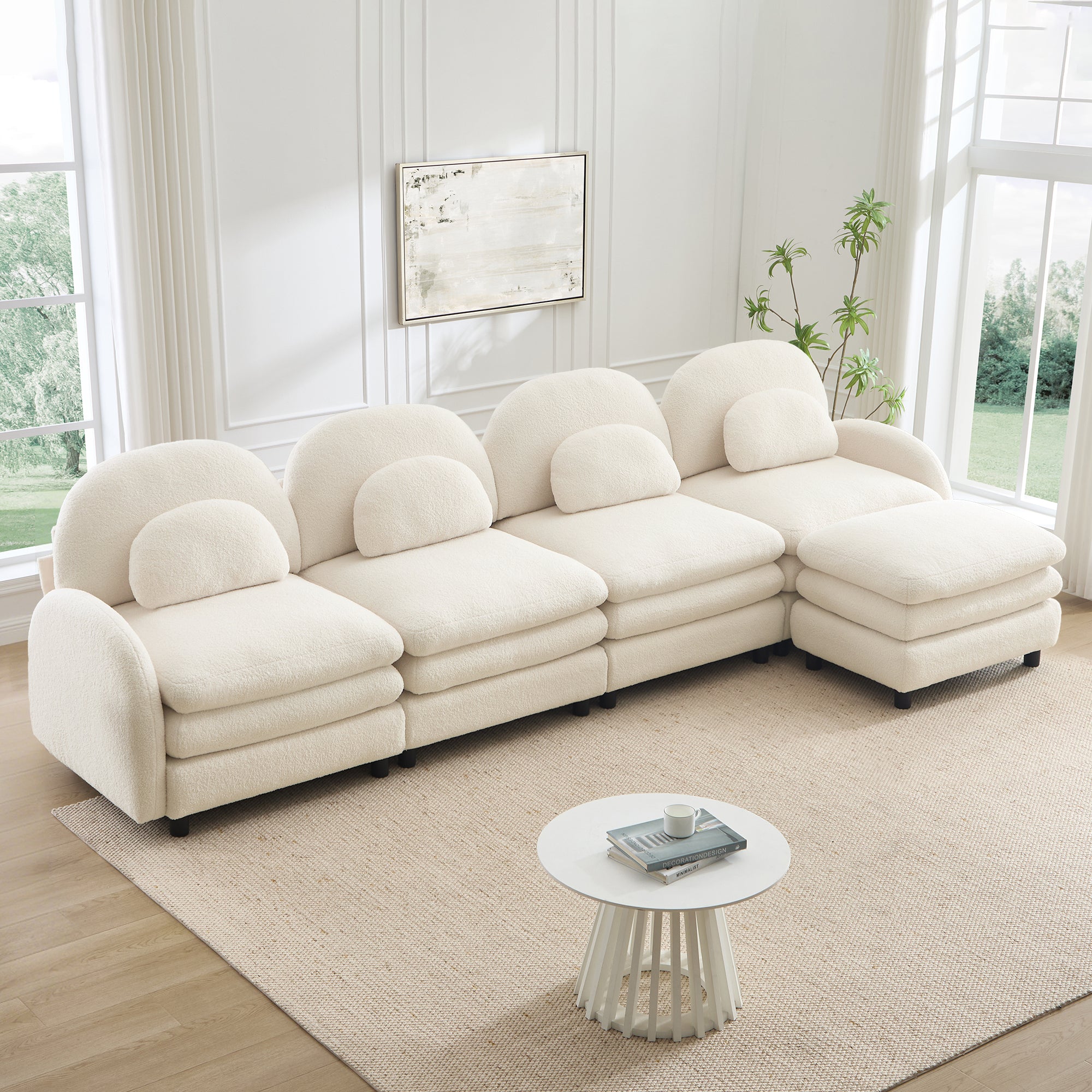 Beige white 4-seat teddy fabric sectional sofa with curved backrests, lumbar pillows, and a matching modular ottoman.
