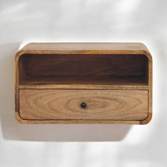 Wooden shelf with a drawer on a white background