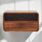 Wooden shelf with a drawer on a white background