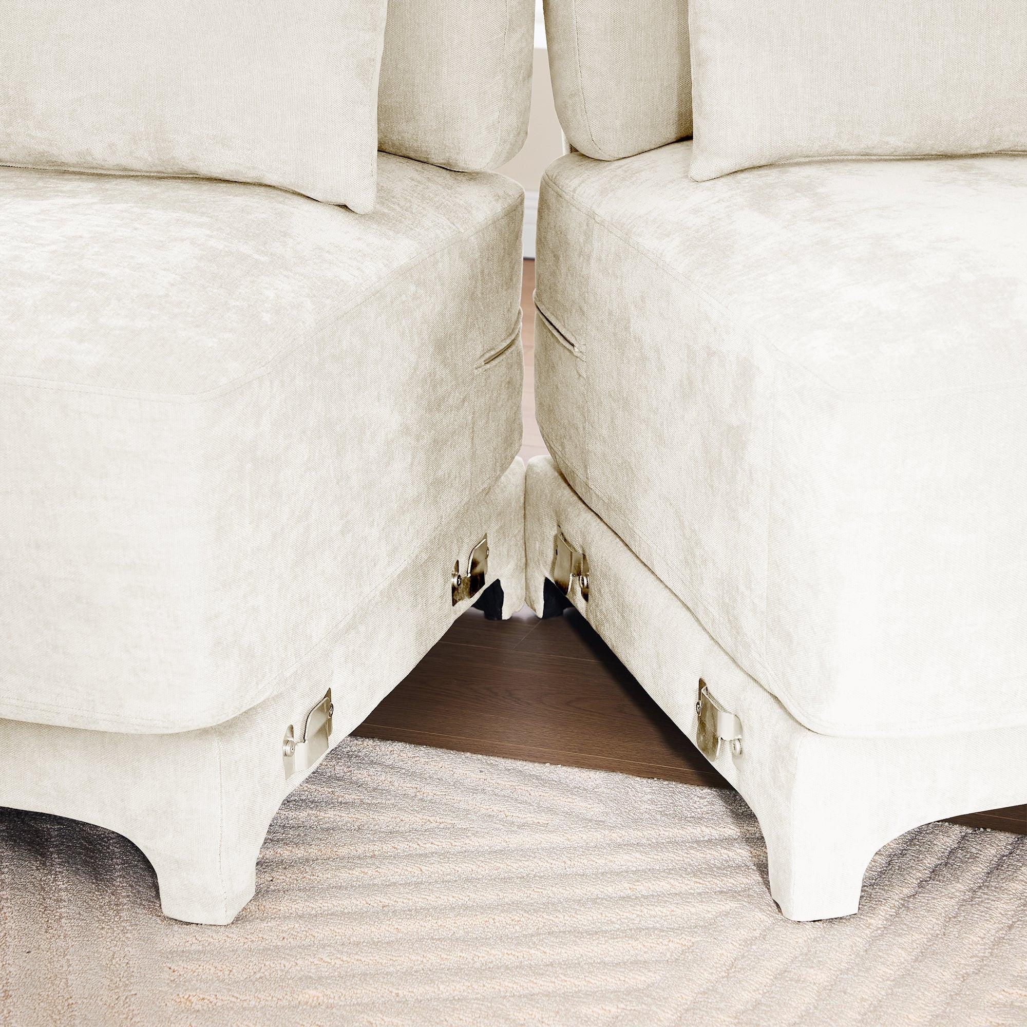 Beige Chenille Four-Seater Sofa with Ottoman Pillow.