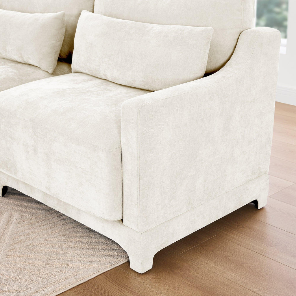 Beige Chenille Four-Seater Sofa with Ottoman Pillow.