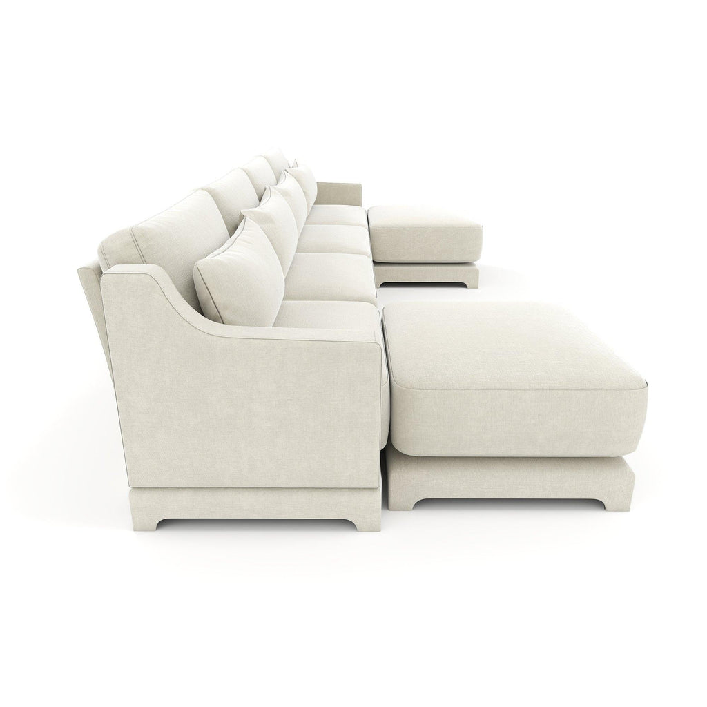 Beige Chenille Four-Seater Sofa with Ottoman Pillow.