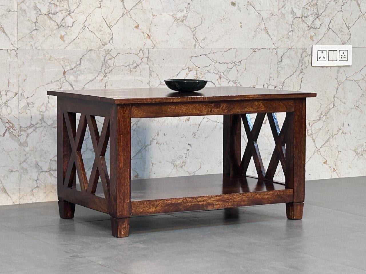 Wooden coffee table with a marble wall background