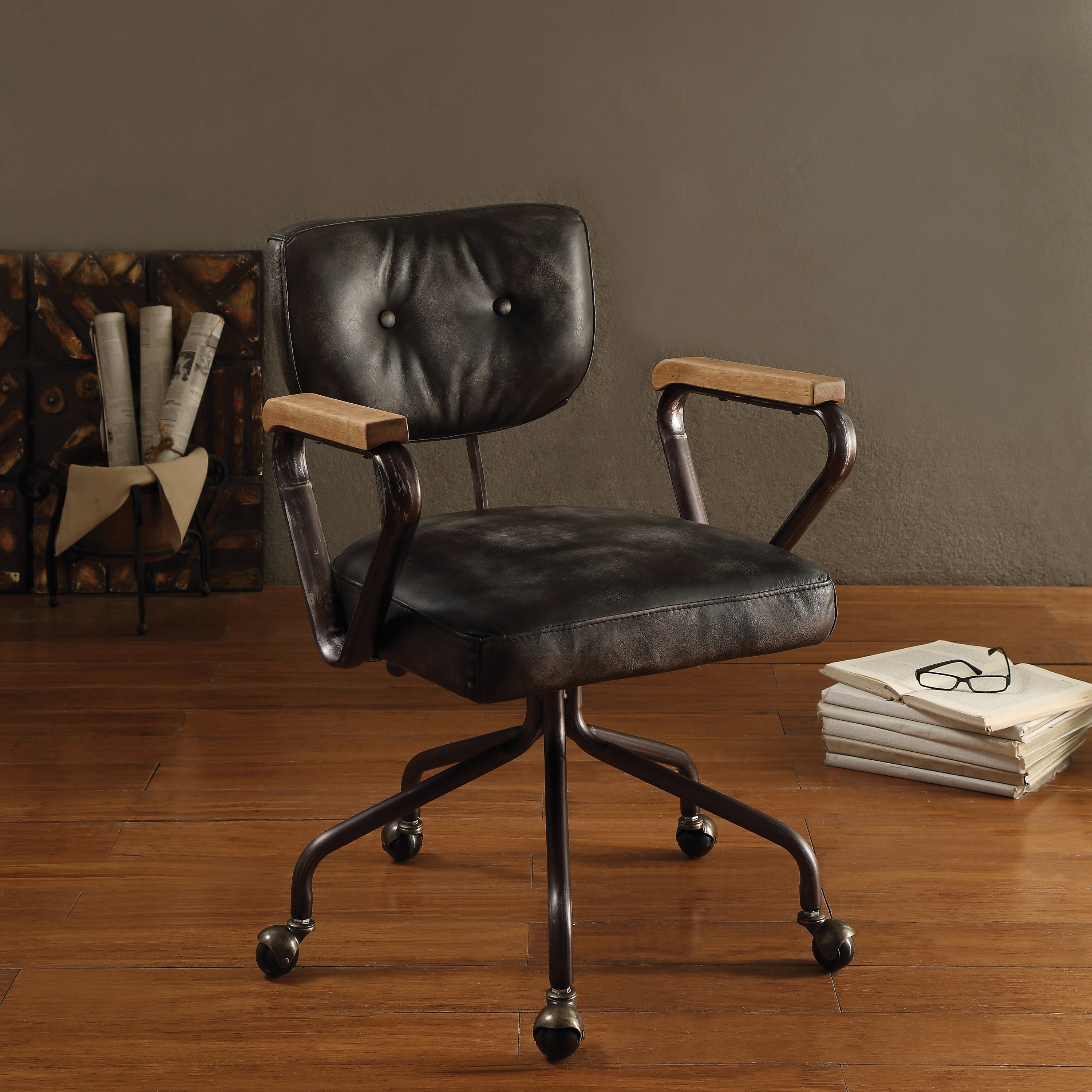 Vintage Black Swivel Office Chair with leather seat, nailhead trim, and wooden armrests in a home office setting. Features tufted back and 5-star base.