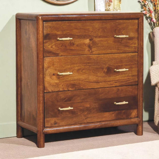 Wooden dresser with three drawers in a room setting