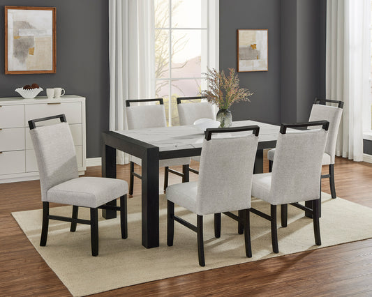 Dining room with a black table and gray chairs on a beige rug.
